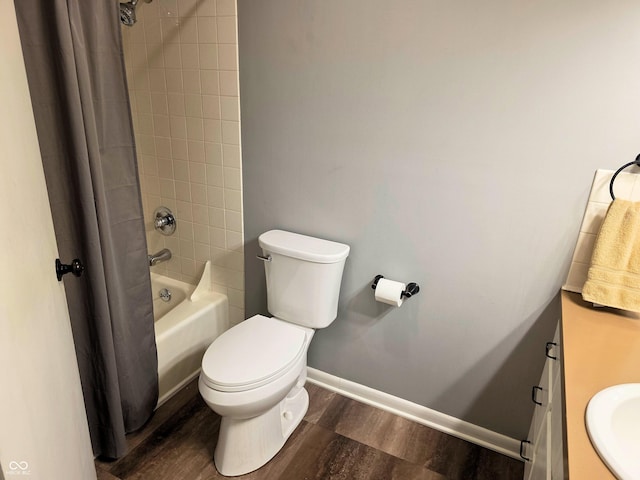 3303 N 850 E, Columbus, IN 47203 - bathroom with vanity, wood finished floors, and shower / bath combo