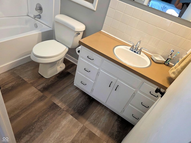 3303 N 850 E, Columbus, IN 47203 - bathroom with wood finished floors, vanity, and decorative backsplash