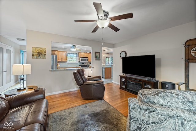 624 Cumberland Ave, West Lafayette, IN 47906 - living room featuring light wood-style floors and ceiling fan