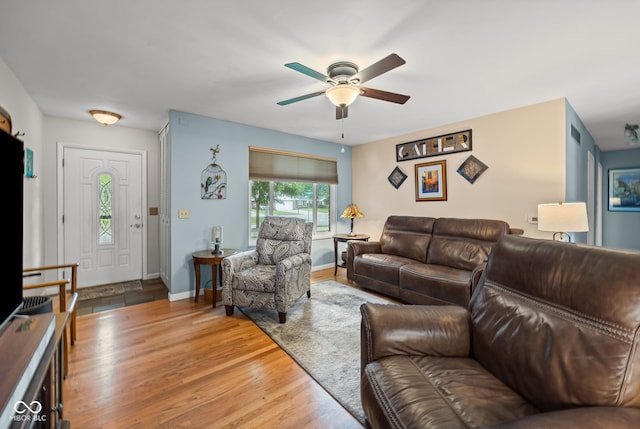 624 Cumberland Ave, West Lafayette, IN 47906 - living area with a ceiling fan and wood finished floors