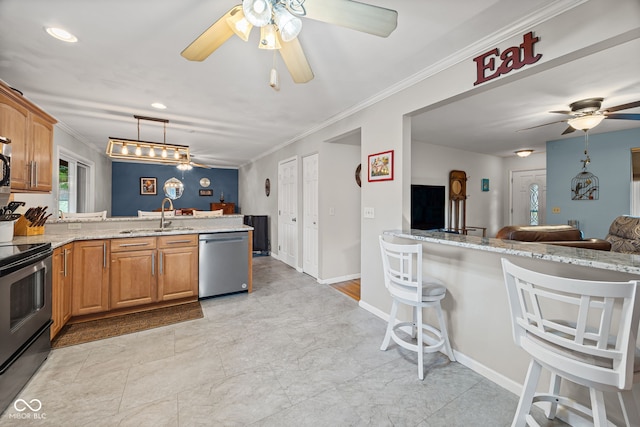 624 Cumberland Ave, West Lafayette, IN 47906 - kitchen featuring appliances with stainless steel finishes, a peninsula, a ceiling fan, ornamental molding, and light stone countertops