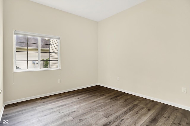 549 Dylan Dr, Avon, IN 46123 - unfurnished room with wood finished floors and baseboards