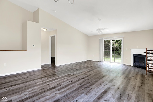 549 Dylan Dr, Avon, IN 46123 - unfurnished living room featuring ceiling fan, wood finished floors, a fireplace, and vaulted ceiling
