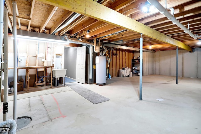 549 Dylan Dr, Avon, IN 46123 - unfinished below grade area featuring gas water heater and a sink