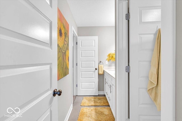 5345 Ridgecrest Ln, Mccordsville, IN 46055 - bathroom with vanity, tile patterned floors, and a textured ceiling