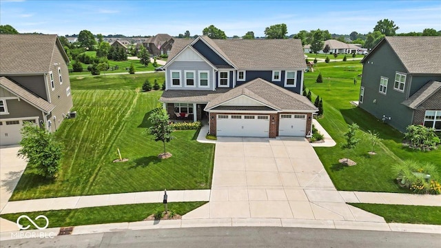 5345 Ridgecrest Ln, Mccordsville, IN 46055 - craftsman inspired home featuring driveway, an attached garage, and a front yard