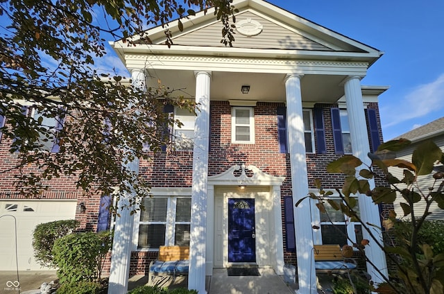 14171 Refreshing Garden Ln, Fishers, IN 46038 - neoclassical home featuring brick siding and covered porch