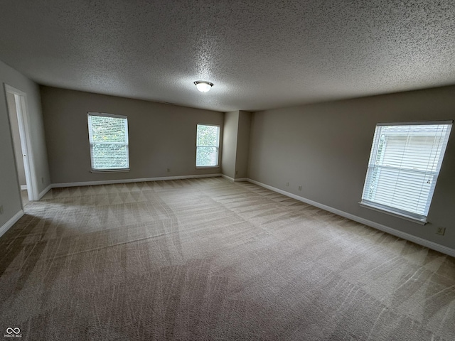 14171 Refreshing Garden Ln, Fishers, IN 46038 - unfurnished room with carpet and a textured ceiling