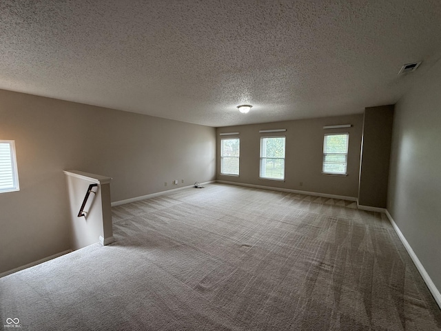 14171 Refreshing Garden Ln, Fishers, IN 46038 - empty room featuring carpet flooring and a textured ceiling