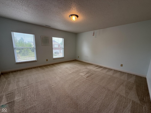 14171 Refreshing Garden Ln, Fishers, IN 46038 - unfurnished room with light colored carpet and a textured ceiling