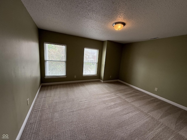 14171 Refreshing Garden Ln, Fishers, IN 46038 - unfurnished room featuring a textured ceiling and carpet