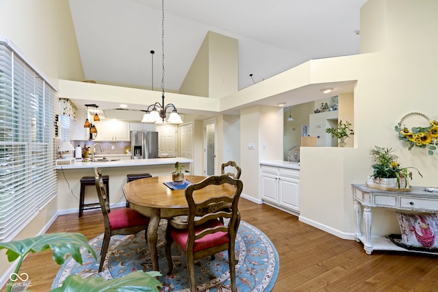 1114 Clairborne Ct, Indianapolis, IN 46280 - dining space with wood finished floors and high vaulted ceiling
