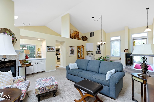 1114 Clairborne Ct, Indianapolis, IN 46280 - living area featuring a chandelier, light carpet, a fireplace, and high vaulted ceiling