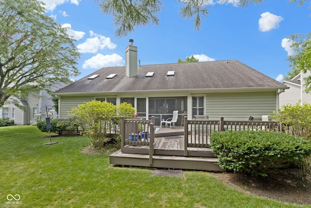 1114 Clairborne Ct, Indianapolis, IN 46280 - back of house with a chimney, a lawn, a deck, and roof with shingles