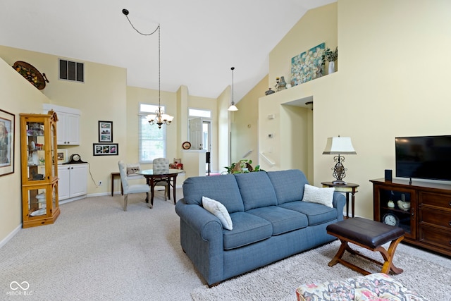 1114 Clairborne Ct, Indianapolis, IN 46280 - living room featuring a chandelier, light colored carpet, and high vaulted ceiling