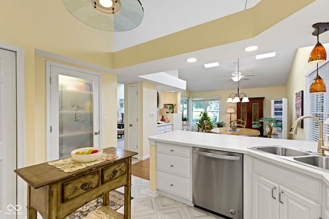 1114 Clairborne Ct, Indianapolis, IN 46280 - kitchen featuring dishwasher, ceiling fan, white cabinetry, recessed lighting, and light countertops