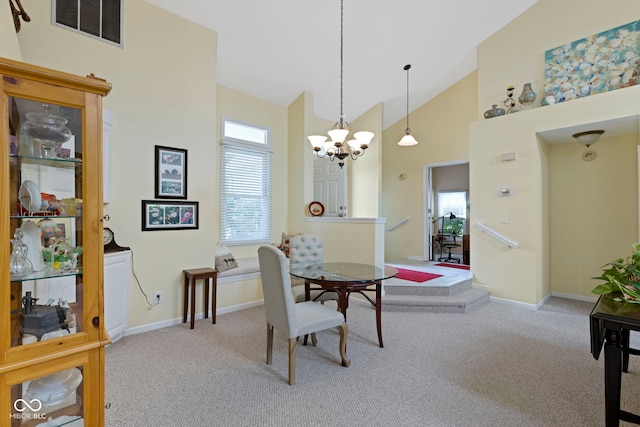1114 Clairborne Ct, Indianapolis, IN 46280 - dining space with carpet flooring, a chandelier, plenty of natural light, and high vaulted ceiling
