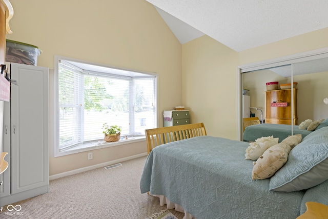 1114 Clairborne Ct, Indianapolis, IN 46280 - carpeted bedroom featuring lofted ceiling, multiple windows, and a closet