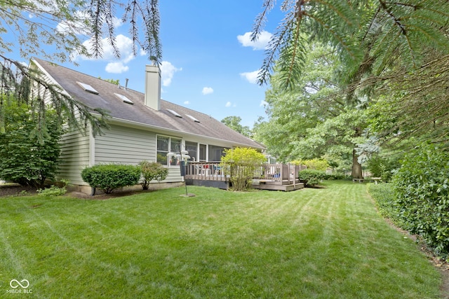 1114 Clairborne Ct, Indianapolis, IN 46280 - view of green lawn featuring a wooden deck