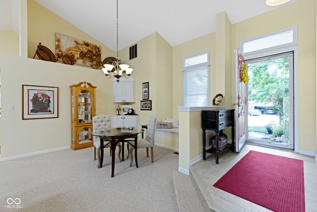 1114 Clairborne Ct, Indianapolis, IN 46280 - dining area featuring a chandelier, light carpet, and high vaulted ceiling