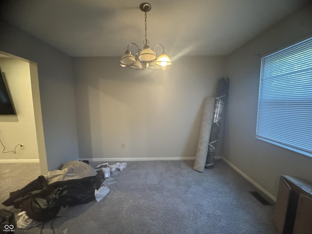 4030 Hollow Creek Dr, Indianapolis, IN 46268 - unfurnished dining area with carpet and a chandelier