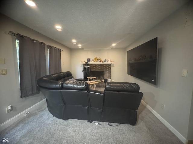 4030 Hollow Creek Dr, Indianapolis, IN 46268 - carpeted living area with a textured ceiling, a brick fireplace, and recessed lighting