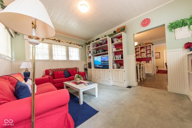 1022 Franklin St, Columbus, IN 47201 - carpeted living area featuring wainscoting and crown molding
