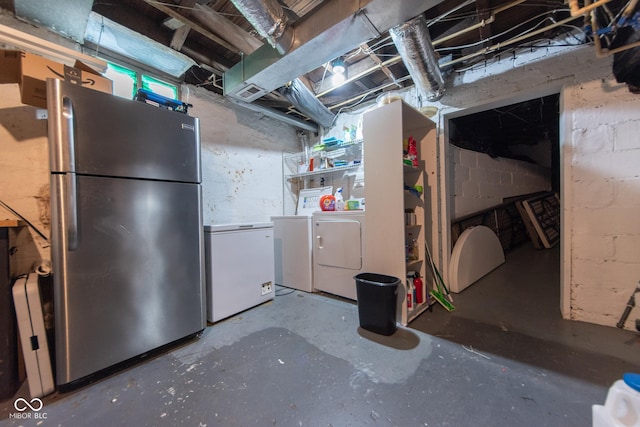 1022 Franklin St, Columbus, IN 47201 - unfinished basement with freestanding refrigerator, fridge, and washer and clothes dryer
