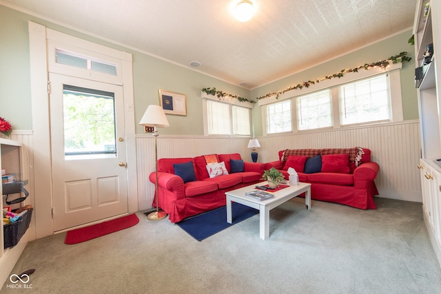1022 Franklin St, Columbus, IN 47201 - living area featuring carpet flooring, wainscoting, ornamental molding, and healthy amount of natural light