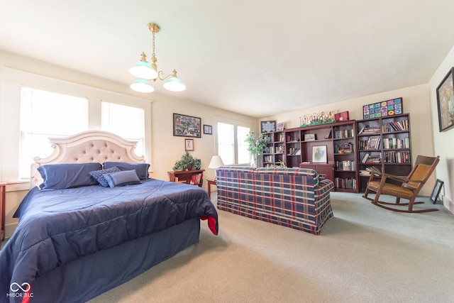 1022 Franklin St, Columbus, IN 47201 - bedroom with carpet flooring and a chandelier