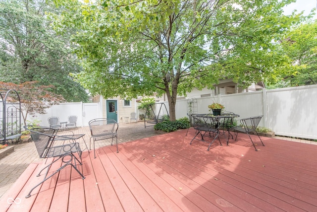1022 Franklin St, Columbus, IN 47201 - wooden terrace with outdoor dining area and an outbuilding
