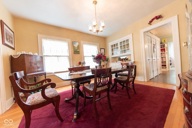 1022 Franklin St, Columbus, IN 47201 - dining area with a chandelier and wood finished floors