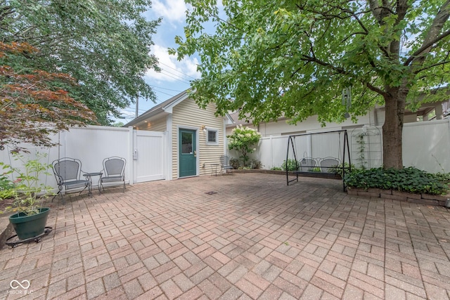 1022 Franklin St, Columbus, IN 47201 - fenced backyard featuring a patio