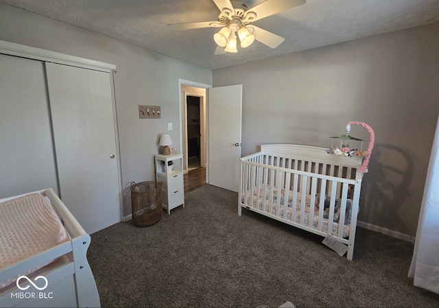 8401 Culpeper Dr, Indianapolis, IN 46227 - carpeted bedroom featuring a closet, a crib, and ceiling fan