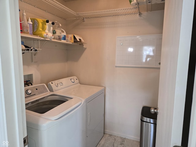 8401 Culpeper Dr, Indianapolis, IN 46227 - laundry area featuring independent washer and dryer and light marble finish flooring
