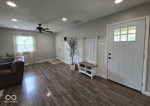 8401 Culpeper Dr, Indianapolis, IN 46227 - foyer entrance featuring dark wood-style flooring, a textured ceiling, a ceiling fan, and recessed lighting