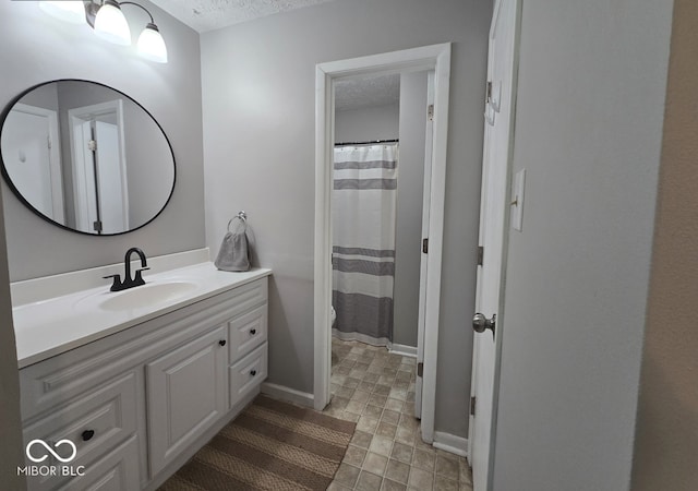 8401 Culpeper Dr, Indianapolis, IN 46227 - full bathroom with vanity and a textured ceiling
