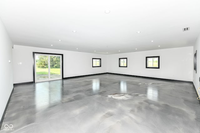 5400 E 200 S, Whitestown, IN 46075 - spare room featuring concrete flooring, healthy amount of natural light, and recessed lighting