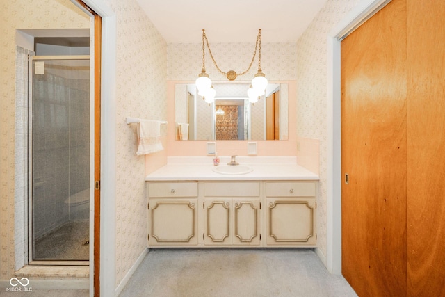 10104 Sycamore Ln, Indianapolis, IN 46239 - bathroom featuring wallpapered walls, vanity, and a shower stall