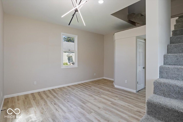 304 W Jefferson St, Kirklin, IN 46050 - unfurnished room featuring stairway and wood finished floors
