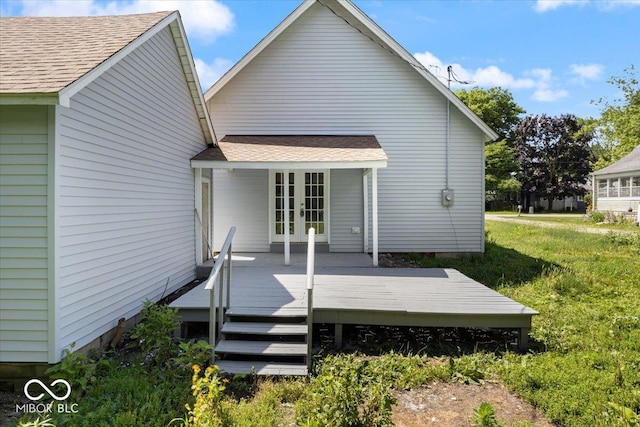 304 W Jefferson St, Kirklin, IN 46050 - back of property featuring french doors, a shingled roof, and a deck