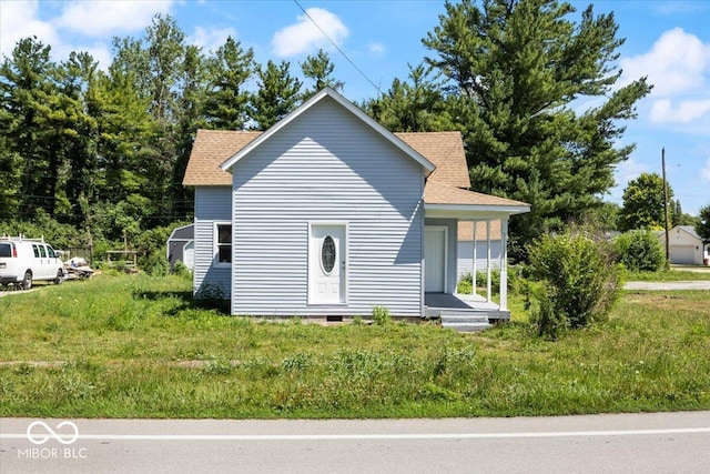 304 W Jefferson St, Kirklin, IN 46050 - view of front of house with roof with shingles and crawl space