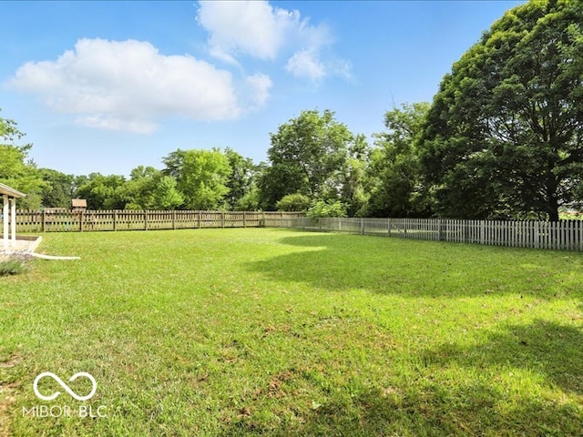 11093 N Pheasant Run, Fairland, IN 46126 - fenced backyard with view of scattered trees