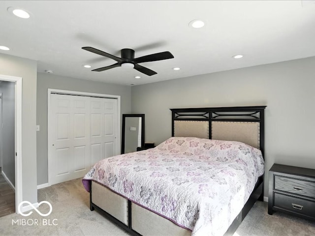 11093 N Pheasant Run, Fairland, IN 46126 - carpeted bedroom with recessed lighting, a closet, and a ceiling fan