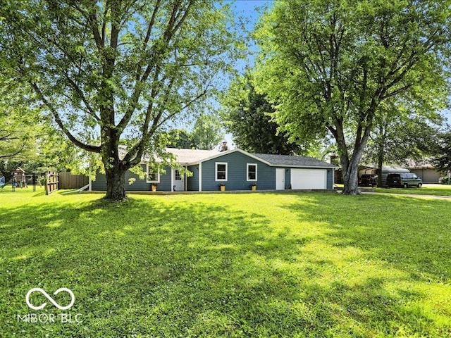11093 N Pheasant Run, Fairland, IN 46126 - view of grassy yard with a garage