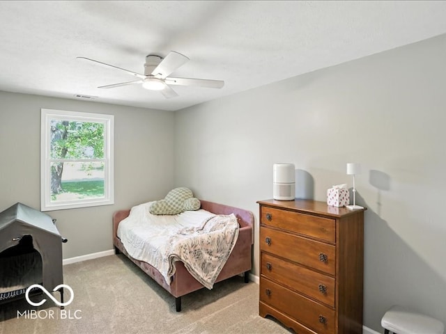 11093 N Pheasant Run, Fairland, IN 46126 - bedroom with light carpet and a ceiling fan