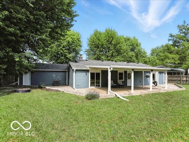 11093 N Pheasant Run, Fairland, IN 46126 - back of property with a patio area and a chimney