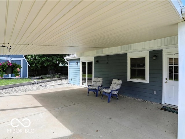 11093 N Pheasant Run, Fairland, IN 46126 - view of patio featuring a storage shed