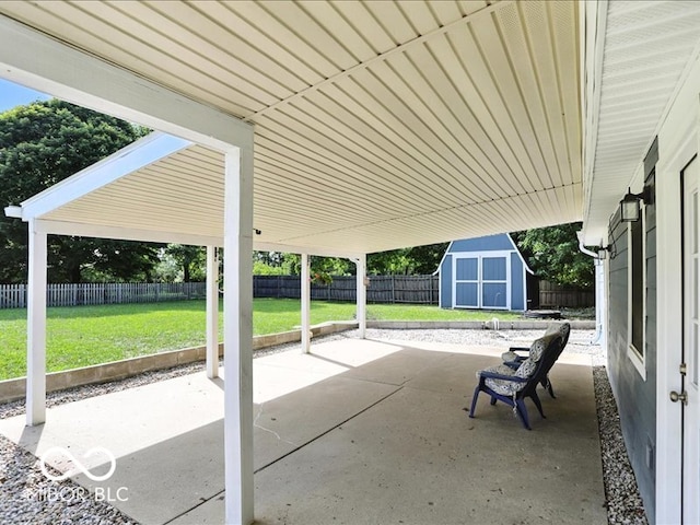 11093 N Pheasant Run, Fairland, IN 46126 - fenced backyard featuring a patio area and a shed