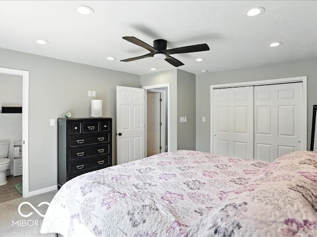 11093 N Pheasant Run, Fairland, IN 46126 - bedroom with recessed lighting, a closet, light carpet, ceiling fan, and ensuite bathroom